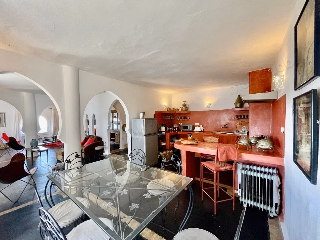Maison traditionnelle avec vue sur la mer