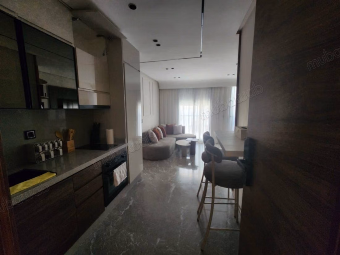 Louez cet appartement à Racine. 1 Salon. Bien meublé